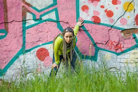 staying young - beauty girl on a graffiti wall background Stock Photo - Budget Royalty-Free & Subscription, Code: 400-05087054