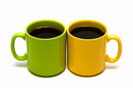 yellow and green mug on a white background Stock Photo - Budget Royalty-Free & Subscription, Code: 400-05087113