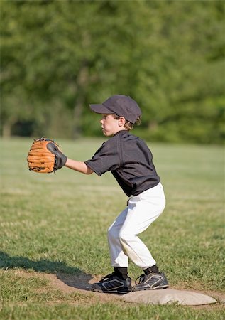 Little Boy Playing First Base Stock Photo - Budget Royalty-Free & Subscription, Code: 400-05087181