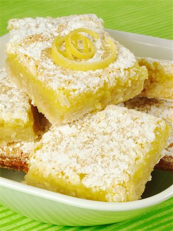 pastry bar - Baked lemon bars sprinkled with powdered sugar. Stock Photo - Budget Royalty-Free & Subscription, Code: 400-05087634