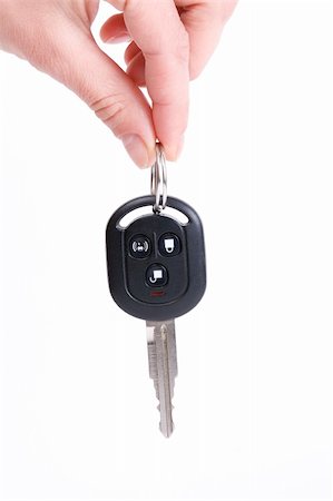 holding automobile keys isolated on white background Stock Photo - Budget Royalty-Free & Subscription, Code: 400-05087706
