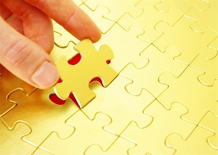 hands holding a puzzle piece . business concepts Stock Photo - Budget Royalty-Free & Subscription, Code: 400-05087755