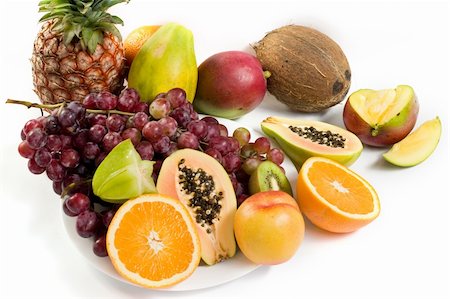 peach slice - Healthy fruit assortment with papaya, kiwi, orange and grapes Stock Photo - Budget Royalty-Free & Subscription, Code: 400-05088189