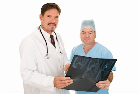 simsearch:400-04217553,k - Handsome doctor and surgeon consulting together on a patient's test results.  Isolated on white. Foto de stock - Royalty-Free Super Valor e Assinatura, Número: 400-05088219