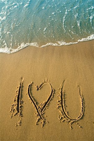 simsearch:400-07265035,k - I love you written in sand on a beach, water in cyan color Stock Photo - Budget Royalty-Free & Subscription, Code: 400-05088358