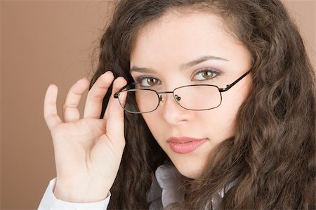 simsearch:400-04763033,k - Young businesswoman serious looking isolated on grey background Photographie de stock - Aubaine LD & Abonnement, Code: 400-05088510