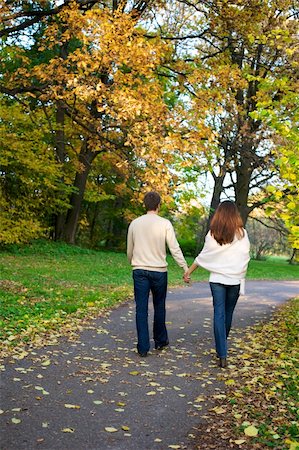 Happy couple on the autumn park Stock Photo - Budget Royalty-Free & Subscription, Code: 400-05088582