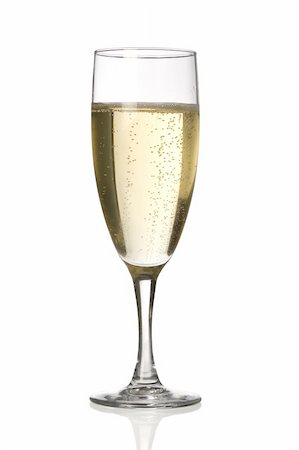 simsearch:400-05748491,k - A champagne flute against a white background. Foto de stock - Royalty-Free Super Valor e Assinatura, Número: 400-05088605