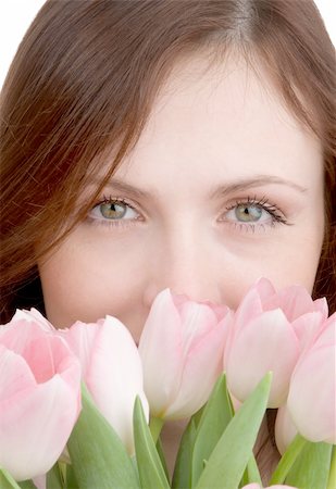 simsearch:689-03124889,k - Woman portrait with bouquet of tulips isolated on white background Photographie de stock - Aubaine LD & Abonnement, Code: 400-05088641