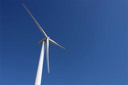 simsearch:400-04024418,k - Wind Energy Turbine against blue sky Fotografie stock - Microstock e Abbonamento, Codice: 400-05088816