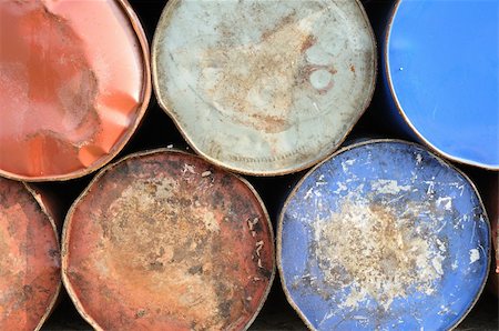 Background of old rusty drums for industrial use Stock Photo - Budget Royalty-Free & Subscription, Code: 400-05089068