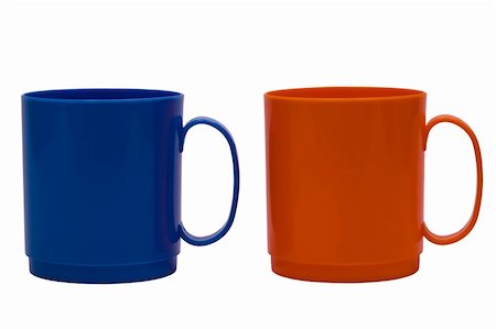 simsearch:400-03971684,k - Dark blue and orange mug on a white background Fotografie stock - Microstock e Abbonamento, Codice: 400-05089107