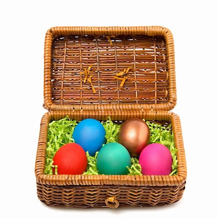 simsearch:400-05040794,k - Five coloured Easter eggs in a rectangular straw casket Stock Photo - Budget Royalty-Free & Subscription, Code: 400-05089117
