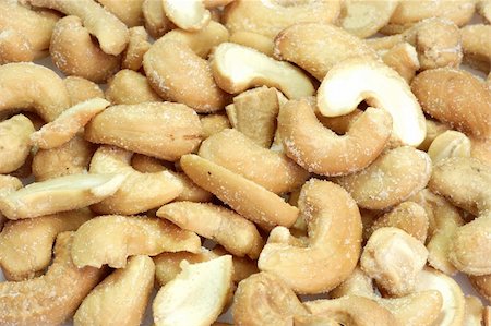 simsearch:400-04180817,k - Cashews in detail as background.  Shot in Studio. Photographie de stock - Aubaine LD & Abonnement, Code: 400-05089285