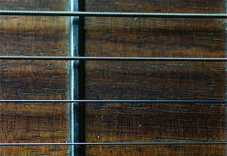 macro closeup shot of guitar neck fretboard Stock Photo - Budget Royalty-Free & Subscription, Code: 400-05089835