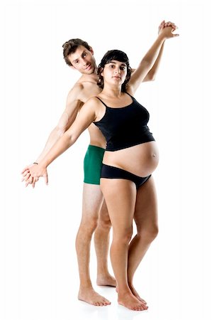 simsearch:400-05337120,k - Beautiful couple expecting a baby making funny poses - Isolated on white Foto de stock - Super Valor sin royalties y Suscripción, Código: 400-05089894