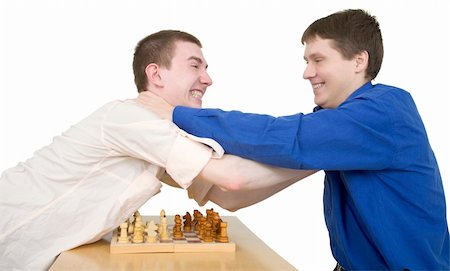 Boys play chess and fight with each other Stock Photo - Budget Royalty-Free & Subscription, Code: 400-05089909