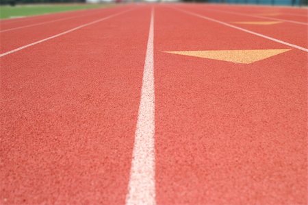 relay race competitions - Red tracks in a stadium for racing. Stock Photo - Budget Royalty-Free & Subscription, Code: 400-05080499