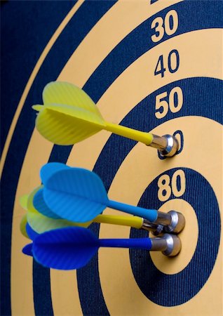 A magnetic dart board with darts. Stock Photo - Budget Royalty-Free & Subscription, Code: 400-05080575