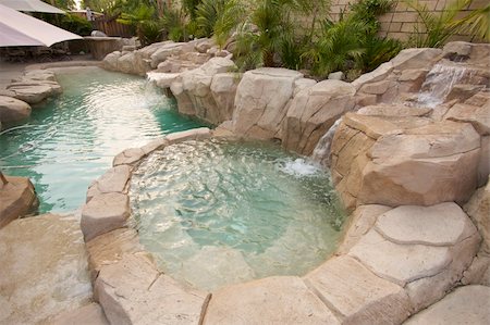 Tropical Custom Pool with waterfalls. Stock Photo - Budget Royalty-Free & Subscription, Code: 400-05080840