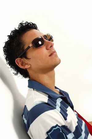 simsearch:400-04539832,k - Portrait of casual trendy hispanic teen wearing sunglasses - isolated Foto de stock - Royalty-Free Super Valor e Assinatura, Número: 400-05080870