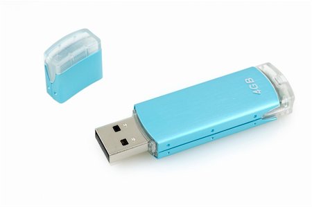 simsearch:400-05259481,k - Usb flash drive in isolated white background Foto de stock - Royalty-Free Super Valor e Assinatura, Número: 400-05080957