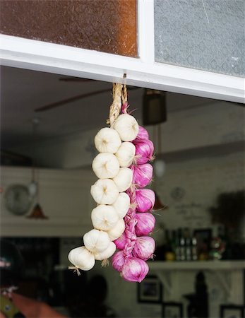 Dried onions hanging in a window. Stock Photo - Budget Royalty-Free & Subscription, Code: 400-05081081
