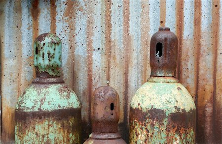 rusting tank - Rusty acetylene and oxygen tanks Stock Photo - Budget Royalty-Free & Subscription, Code: 400-05081177