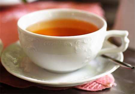 Cup of tea on a table Fotografie stock - Microstock e Abbonamento, Codice: 400-05081401
