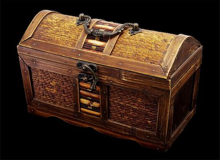 Wooden chest with iron handles on a dark background Stock Photo - Budget Royalty-Free & Subscription, Code: 400-05081516