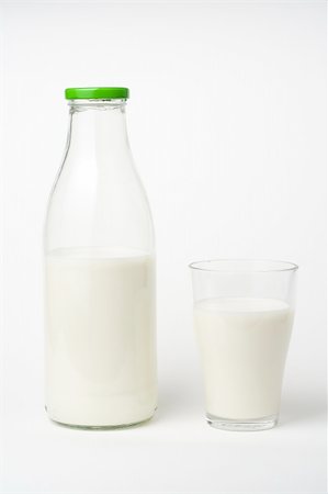 pouring fresh glass of milk isolated over white Stock Photo - Budget Royalty-Free & Subscription, Code: 400-05081902