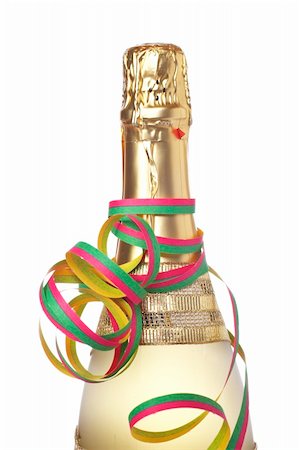 simsearch:400-05082002,k - Bouteille de Champagne avec des rubans pour les célébrations isolées sur fond blanc Photographie de stock - Aubaine LD & Abonnement, Code: 400-05082001