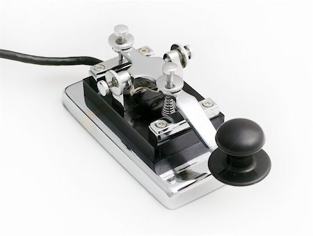 vintage morse telegraph key with white background Stock Photo - Budget Royalty-Free & Subscription, Code: 400-05082032