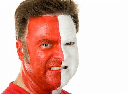 face painting for football - Closeup portrait of an aggressive sports fan wearing face paint. Stock Photo - Budget Royalty-Free & Subscription, Code: 400-05082213