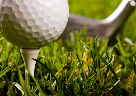 range shooting - Golf ball on tee in grass. Stock Photo - Budget Royalty-Free & Subscription, Code: 400-05082314