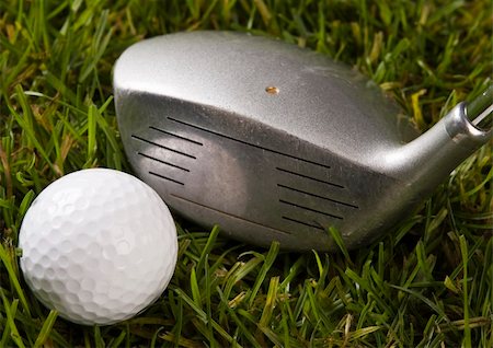 range shooting - Golf ball on tee in grass. Foto de stock - Super Valor sin royalties y Suscripción, Código: 400-05082333