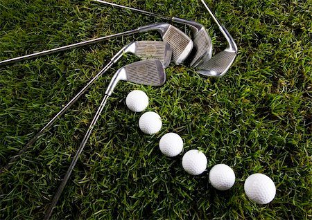 range shooting - Golf ball on tee in grass. Stock Photo - Budget Royalty-Free & Subscription, Code: 400-05082380