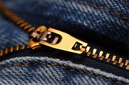 fine closeup image of classic jeans zip Stock Photo - Budget Royalty-Free & Subscription, Code: 400-05082496