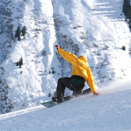 Young snowboarder having a soft landing in the powder snow Stock Photo - Budget Royalty-Free & Subscription, Code: 400-05082907