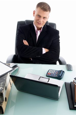 young businessman with crossed arms in an office Stock Photo - Budget Royalty-Free & Subscription, Code: 400-05083216