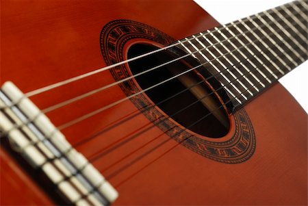 simsearch:400-07505739,k - Acoustic six-string guitar. Covered by a brown varnish Stock Photo - Budget Royalty-Free & Subscription, Code: 400-05083736