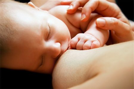 close up of newborn baby near breast Stock Photo - Budget Royalty-Free & Subscription, Code: 400-05094498