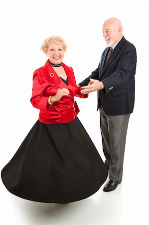 Beautiful senior lady spinning as she dances with her husband. Full body isolated on white. Stock Photo - Budget Royalty-Free & Subscription, Code: 400-05095335