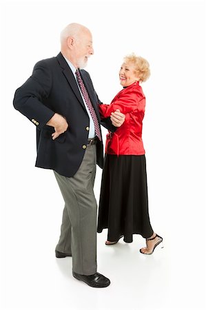 senior woman at christmas parties - Happy senior couple having a great time square dancing.  Isolated on white. Stock Photo - Budget Royalty-Free & Subscription, Code: 400-05095349