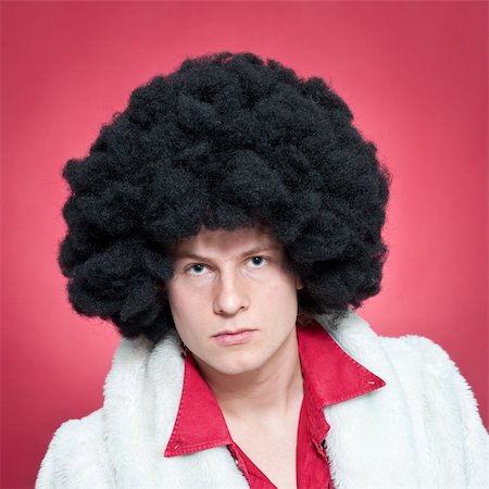 Arrogantly looking man, wearing a wig and a fur coat. Stock Photo - Budget Royalty-Free & Subscription, Code: 400-05095617