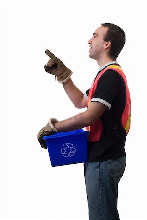 simsearch:400-05060474,k - A young service worker pointing at your text, isolated against a white background Foto de stock - Super Valor sin royalties y Suscripción, Código: 400-05096295