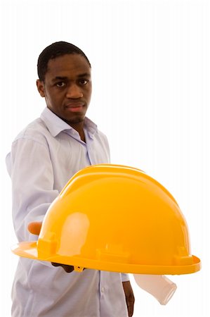 A man giving you a yellow helmet to protect your head Stock Photo - Budget Royalty-Free & Subscription, Code: 400-05096453