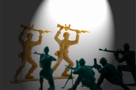 Isolated Plastic Toy Soldiers - Surrender Concept Stock Photo - Budget Royalty-Free & Subscription, Code: 400-05097011
