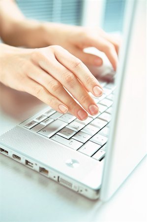 simsearch:400-07546122,k - Hand and computer. Stock Photo - Budget Royalty-Free & Subscription, Code: 400-05097055