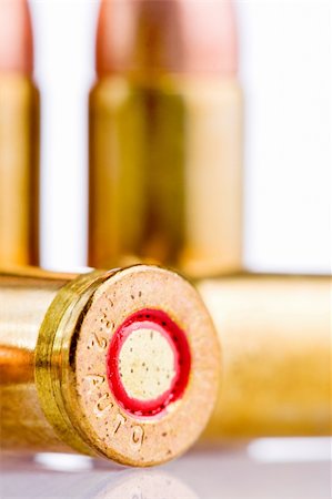simsearch:400-05706425,k - close up of bullets isolated on white Fotografie stock - Microstock e Abbonamento, Codice: 400-05097256